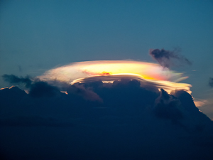 Lenticular Clouds Illuminated by a Sunrise, South Shore of Puerto Rico.
